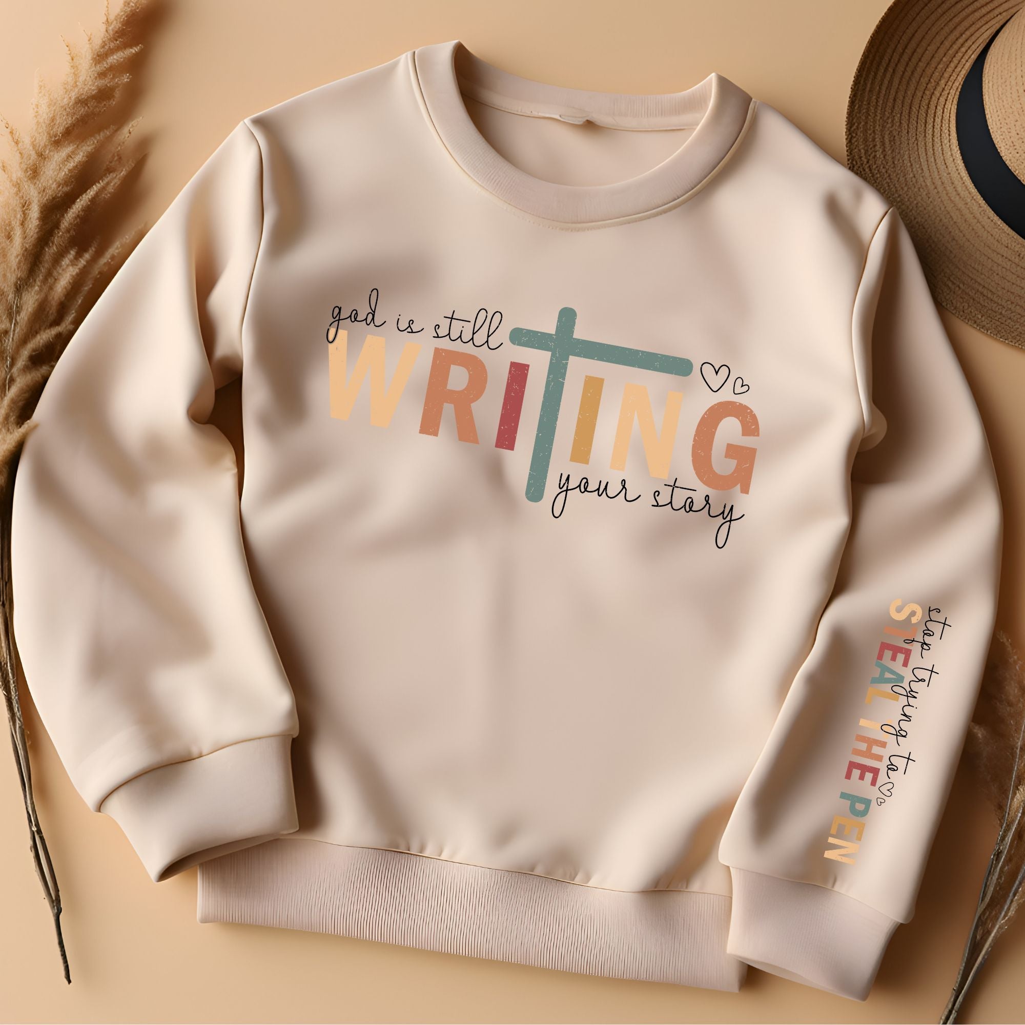 God Is Still Writing Your Story Sweatshirt - Sleeve Print